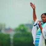 Banerjee addresses her supporters during a rally in Kolkata