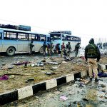 Indian soldiers examine the debris after an explosion in Lethpora in south Kashmir’s Pulwama district